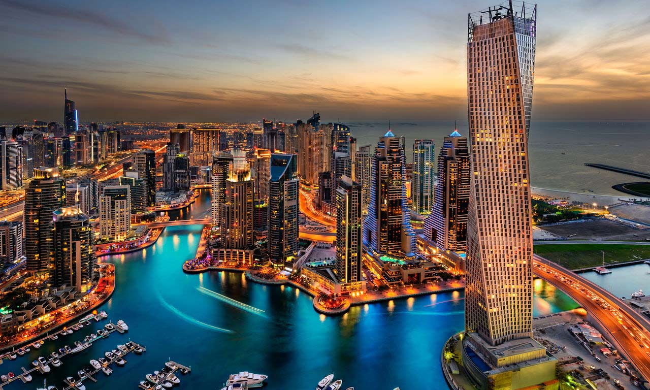 00033 dubai skyline nacht traumurlaub strand günstig reisen