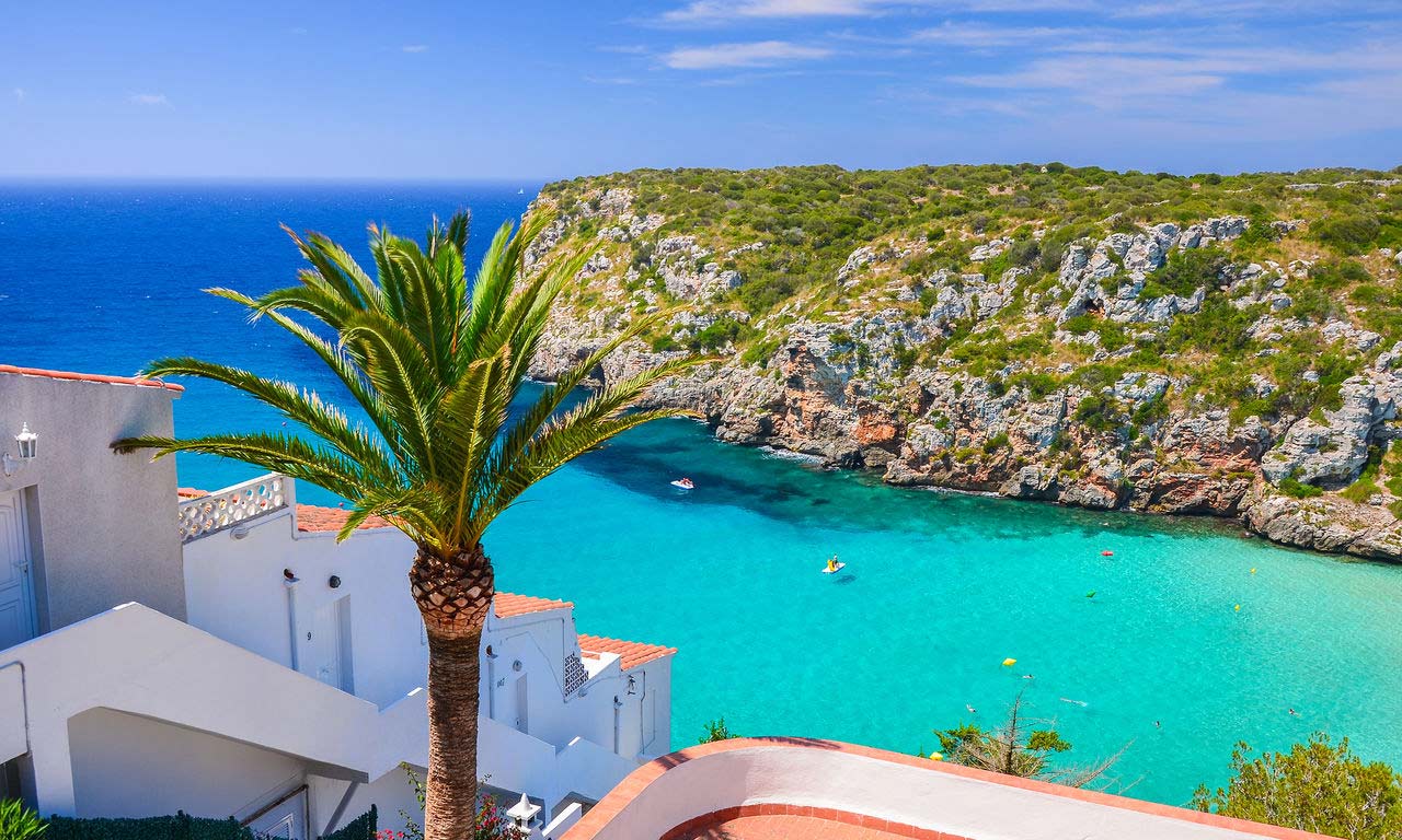00417 spanien hotels in menorca cala porter palmen türkises wasser traumurlaub sommer mittelmeer baden sonne strand